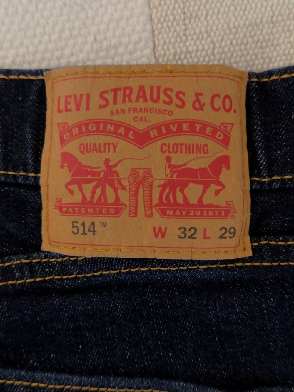 Levi's 514 Men’s Slim Straight Jeans in Dark Blue with Tan Patch